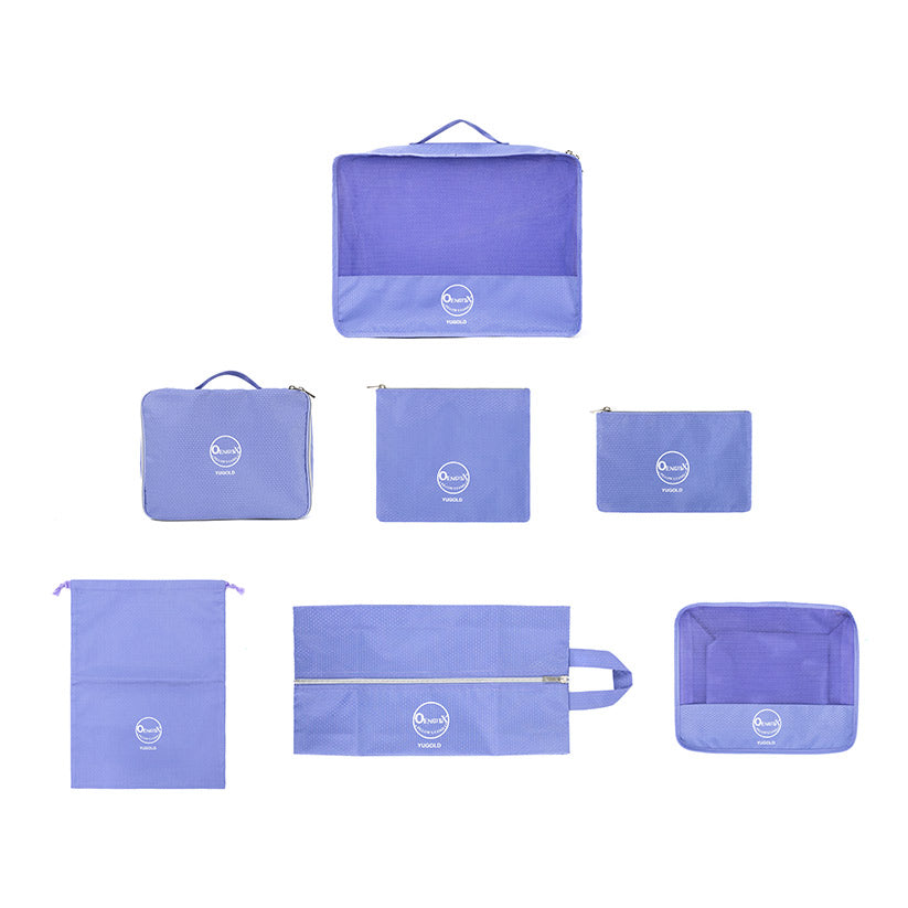 Close‑up of purple cable and toiletry pouches from the 7‑piece set